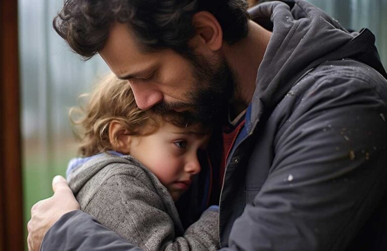 father embracing child missing